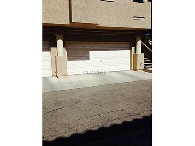 Property Photo. two car garage with a storage room