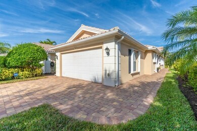 View of side of property featuring a garage