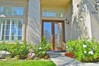 Signature double doors with plantation shutters