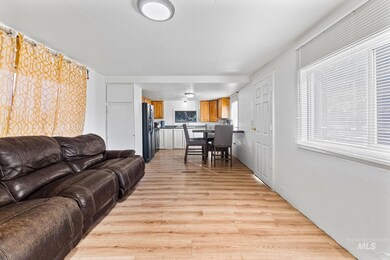 Living area featuring light wood-type flooring