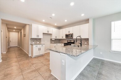 Bright and cheery kitchen with great storage