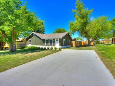 Ranch-style home featuring a front yard