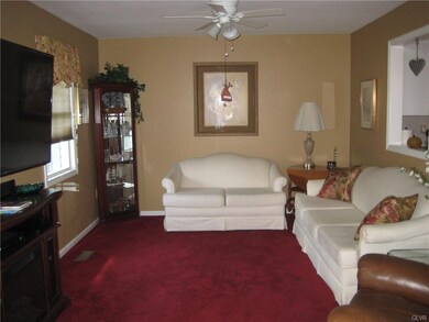 Living room is spacious, providing plenty of optio