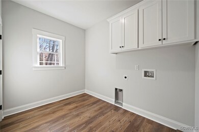The utility room is oversized and perfect for extr