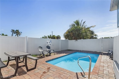 View of swimming pool featuring a patio (Photo may