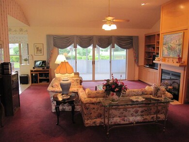 View of family room from foyer.Kitchen to left.