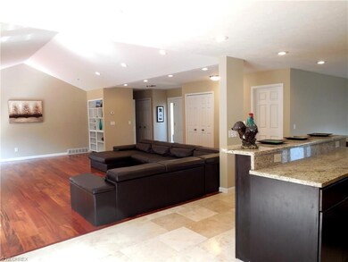 ONE OF TWO GRANITE BARS THAT SEATS 4.