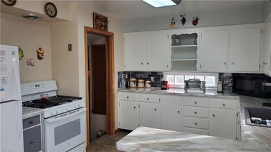 Kitchen with new countertop, sink, fixtures, hardw