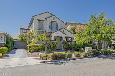 View of front of property with a garage, stucco siding, driveway, and a tiled roof