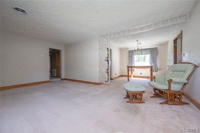 Living room is open to the dining area.