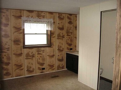Den. I call it a den, but it was a bedroom with a 