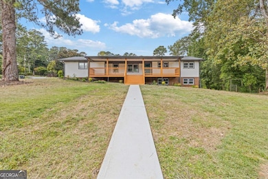 551 Briggs Cir SW, Lilburn, GA 30047 - photo 2