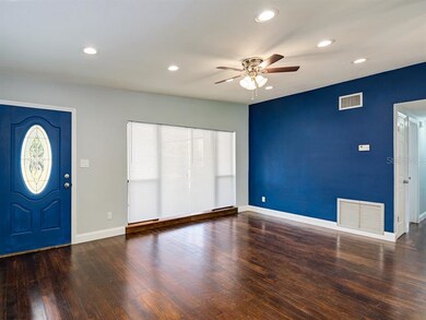 Once inside the RICH MAPLE WOOD FLOORS stand out. 