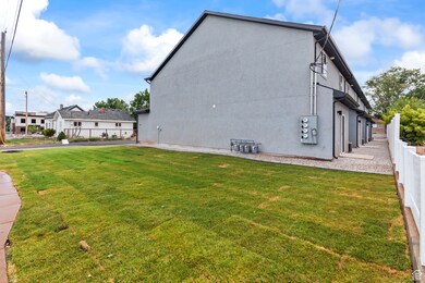View of side of property with stucco siding