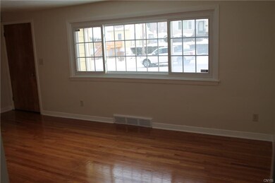 Living Room with New Windows Throughout