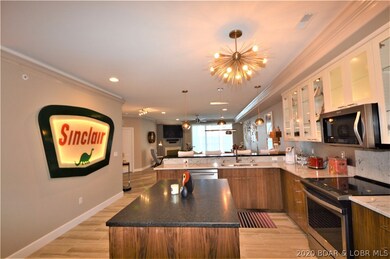 Unique light fixtures and gorgeous countertops