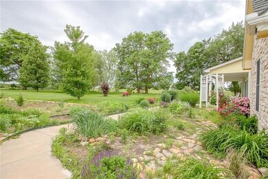 Incredible landscaping with gorgeous rose bushes