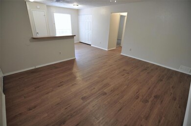 Unfurnished room featuring a textured ceiling, da