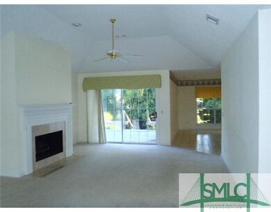 Living Room. You take ease by the finrplace on col