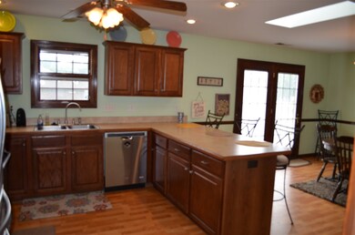 This breakfast bar holds 4 bar stools easily and o