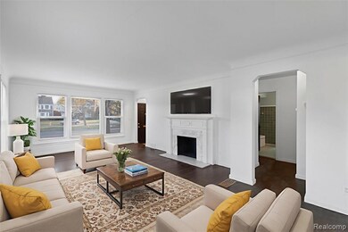 Living room featuring dark wood-style flooring and a premium fireplace