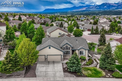 Aerial perspective of suburban area with a mountain backdrop