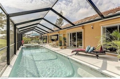 View of pool featuring a patio area, a lanai, and 