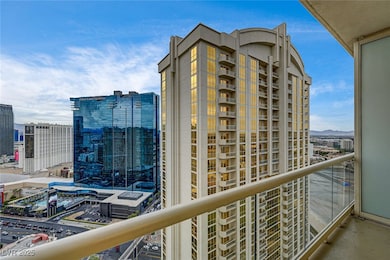 Balcony featuring a view of city