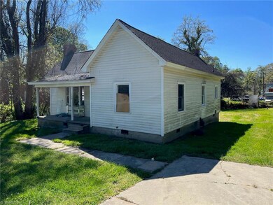 This home features large covered porch and low maintenance vinyl exterior.