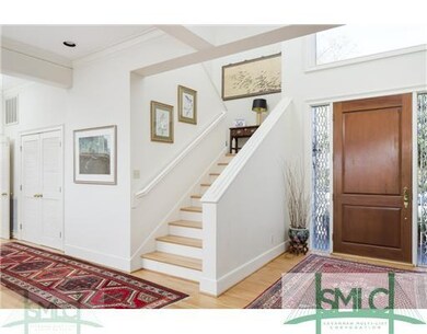 4x8 Mahogany entrance door invites you into the Gr