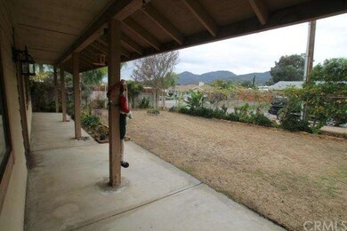  Covered front porch with mountain views