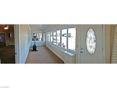 The sun room with its surrounding windows and bead