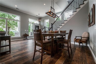 PLENTY OF ROOM IN THE DINING AREA FOR FAMILY AND G