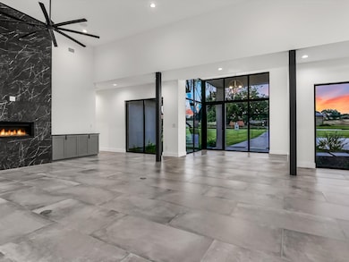 Unfurnished living room featuring visible vents, r