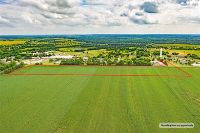 Birds eye view of property with a rural view