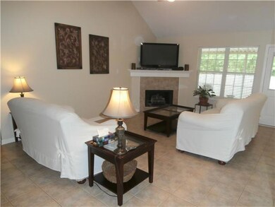 Vaulted Ceiling, new tile floor, fireplace, pictur