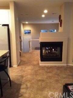 This dual fireplace can be enjoyed both in the din