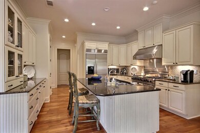 Gourmet kitchen with Viking appliances and large i