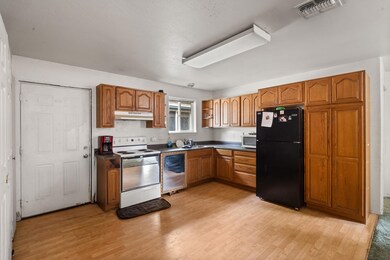 Kitchen with wooden cabinetry