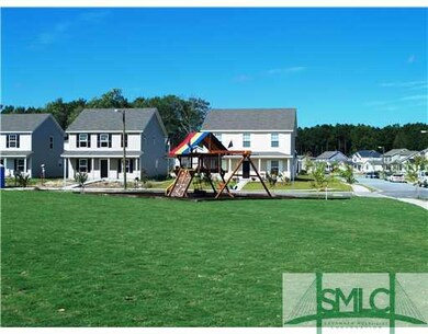 Exterior Front. playground and greenspace