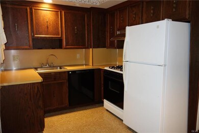 Kitchen area - gas range with self-cleaning stove,