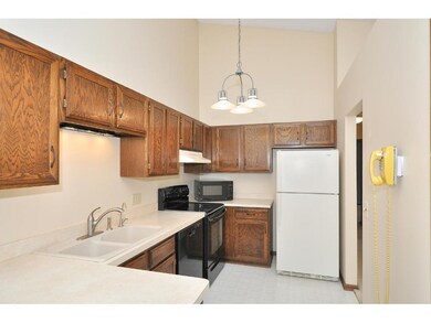 Kitchen with vaulted ceiling, sky light and pantry