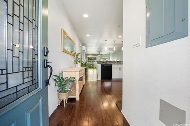 Front door leads you to open space kitchen