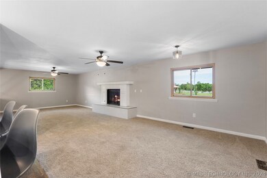 large family room with wood burning fireplace