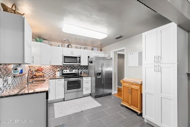 3770 Haslett Dr E, Jacksonville, FL 32277 - photo 2