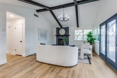 Living room with light wood finished floors, visib