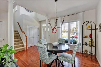 Living room/dining room with hardwood floors