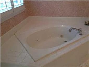 Master Bath has jetted garden tub