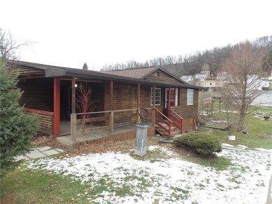 SIDE VIEW OF PORCH AND KITCHEN ENTRY