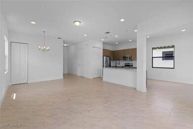 Unfurnished living room with a chandelier, recesse